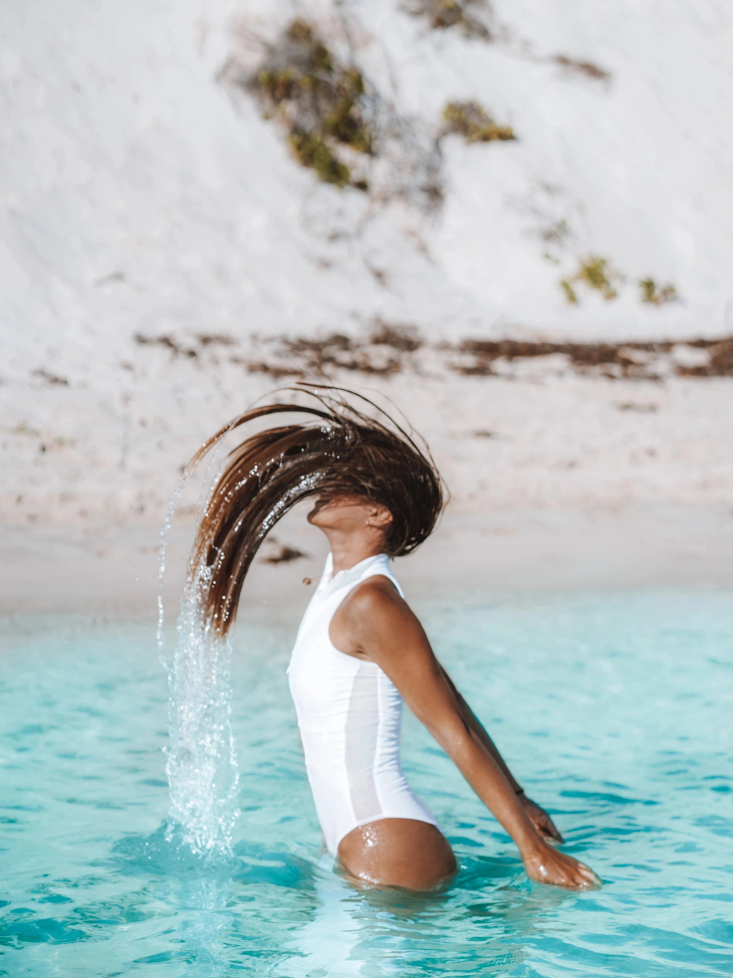 White one piece suit The Mentawai Ocean Soul Bali