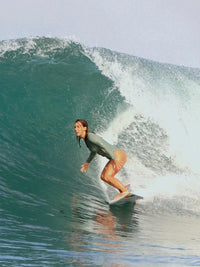 surfer girl  wearing Long sleeve swimsuit| The Sulawesi in Olive